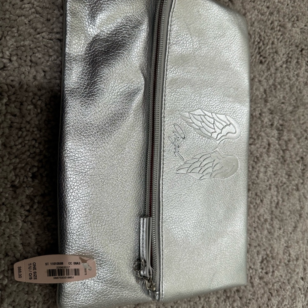 Victoria secret silver pouch.